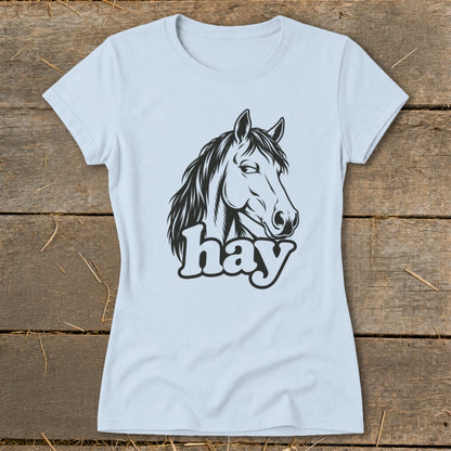 Light blue t-shirt with a black line drawing of a horse's head and the word "hay".