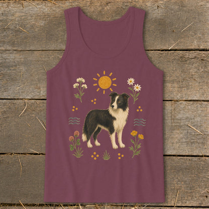 Burgundy tank top with a watercolor illustration of a border collie surrounded by flowers and sun.