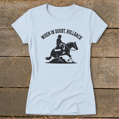 Light blue t-shirt with black graphic of a rider on a horse and text "WHEN IN DOUBT, ROLLBACK".