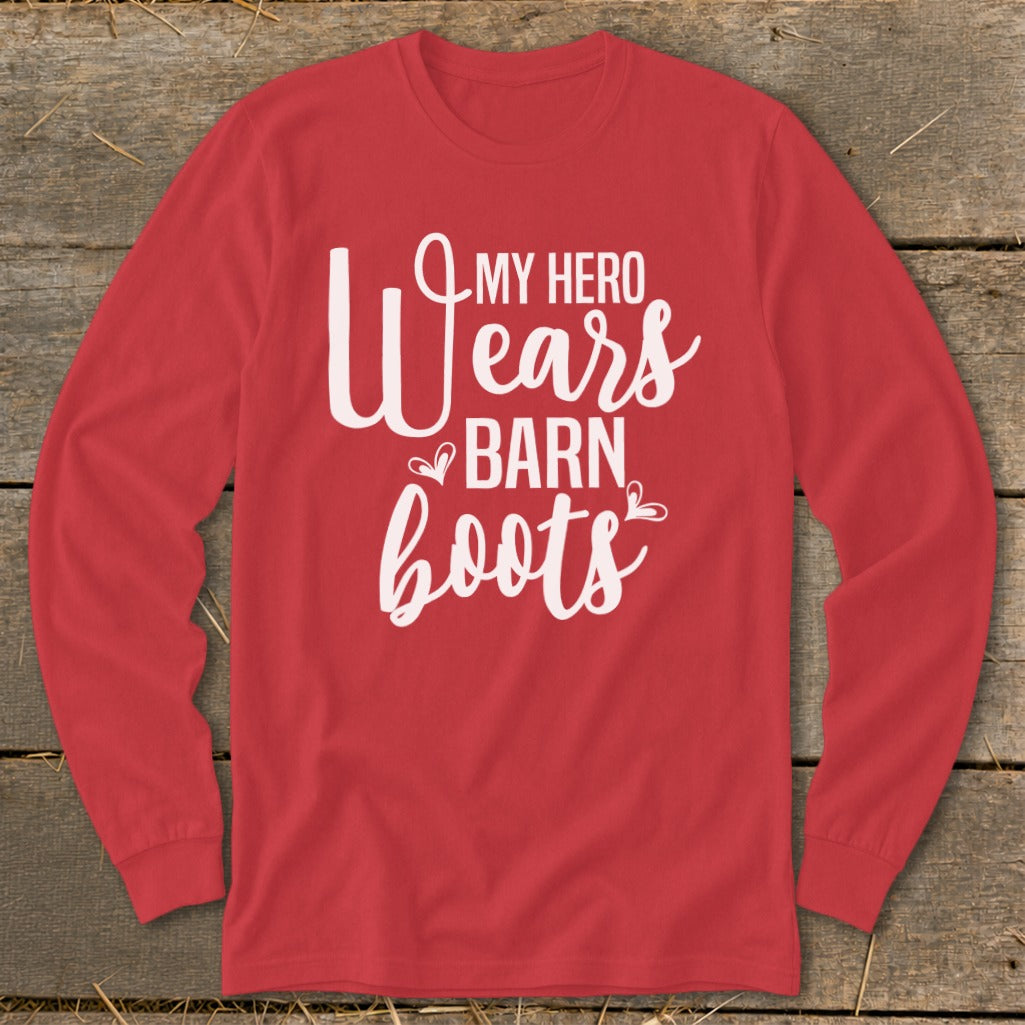 Red long sleeve shirt with white text: "My Hero Wears Barn Boots"