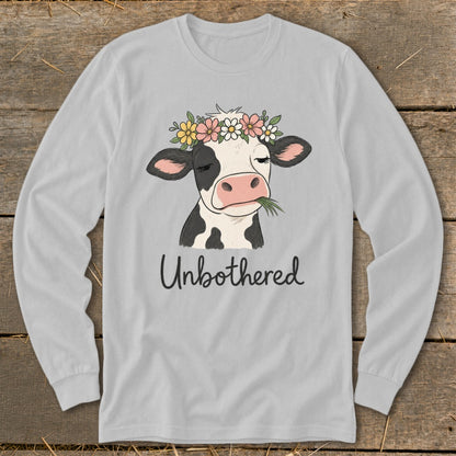 Long sleeve gray shirt with a cow wearing a flower crown and the text "Unbothered."