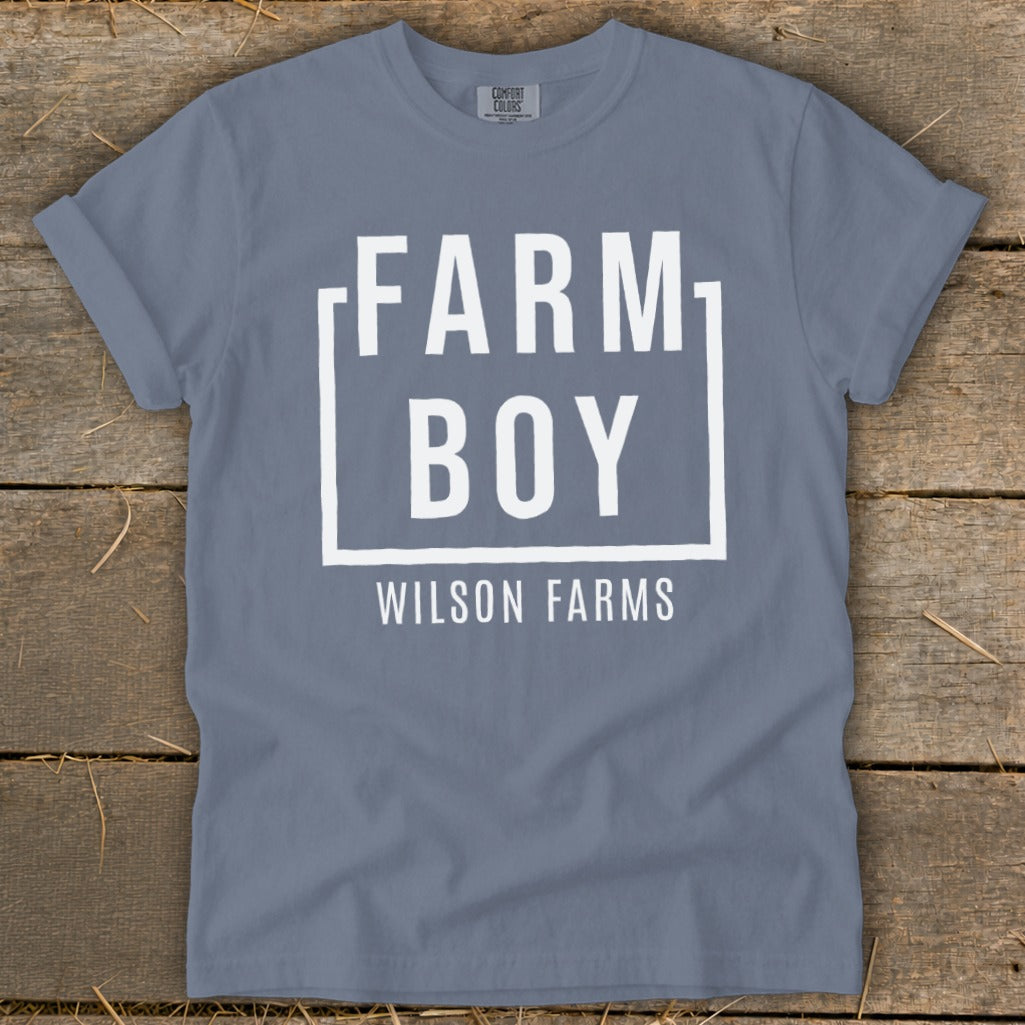 Blue t-shirt with white "FARM BOY WILSON FARMS" text in a box.