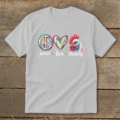 Light grey t-shirt with peace sign, heart, and colorful chicken graphic and text.