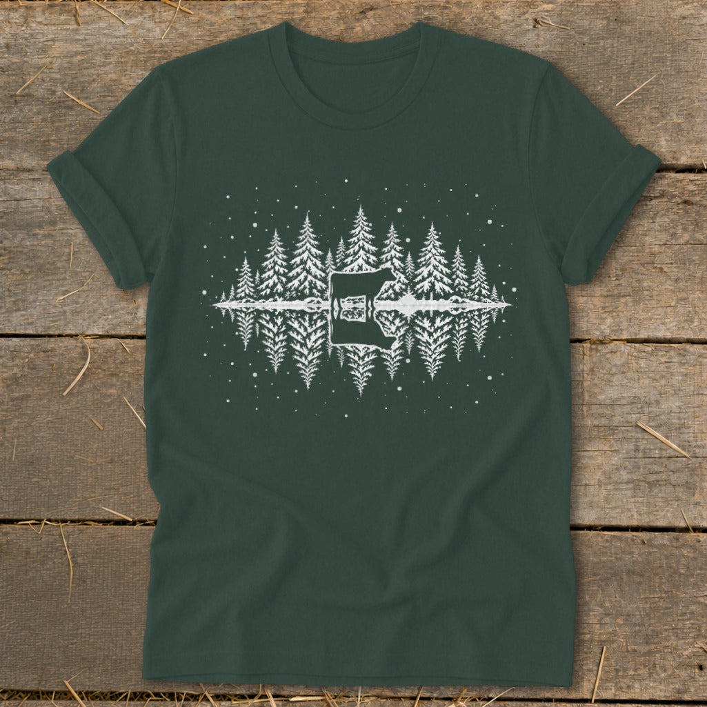Dark green t-shirt with white pine trees reflected in water and a guitar.
