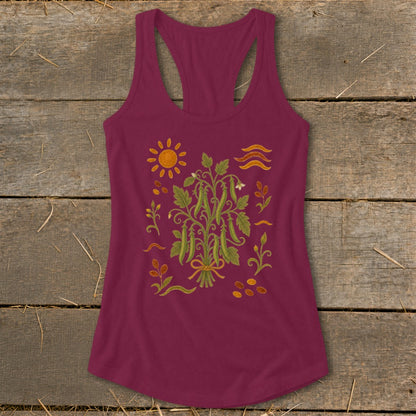 Maroon tank top with a graphic of a pea plant, sun, and stylized waves.