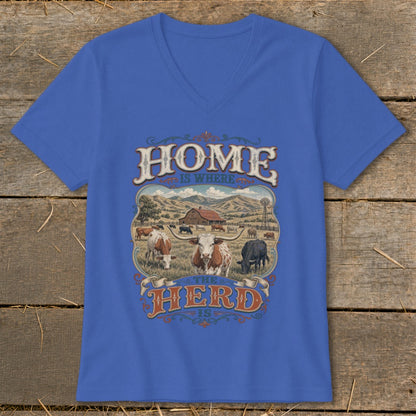 Blue v-neck t-shirt with "HOME IS WHERE THE HERD IS" graphic and farm scene.