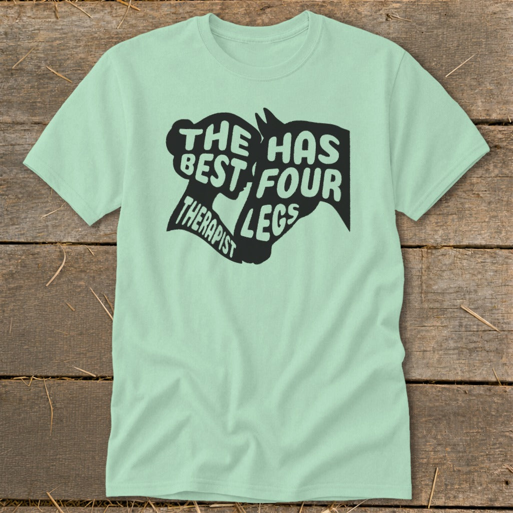 Mint green t-shirt with black graphic text: The best therapist has four legs.
