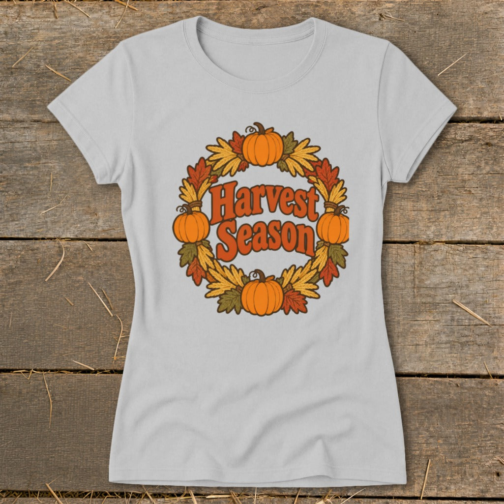 Light gray t-shirt with a circular harvest wreath graphic and text.