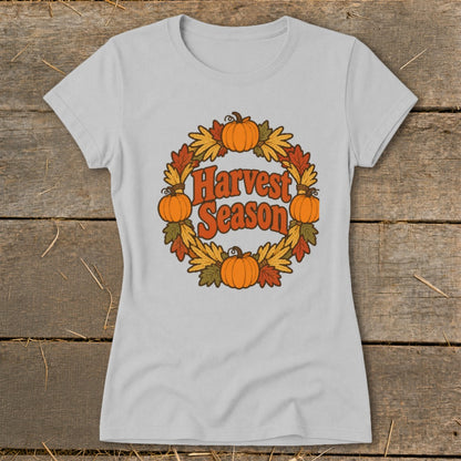 Light gray t-shirt with a circular harvest wreath graphic and text.