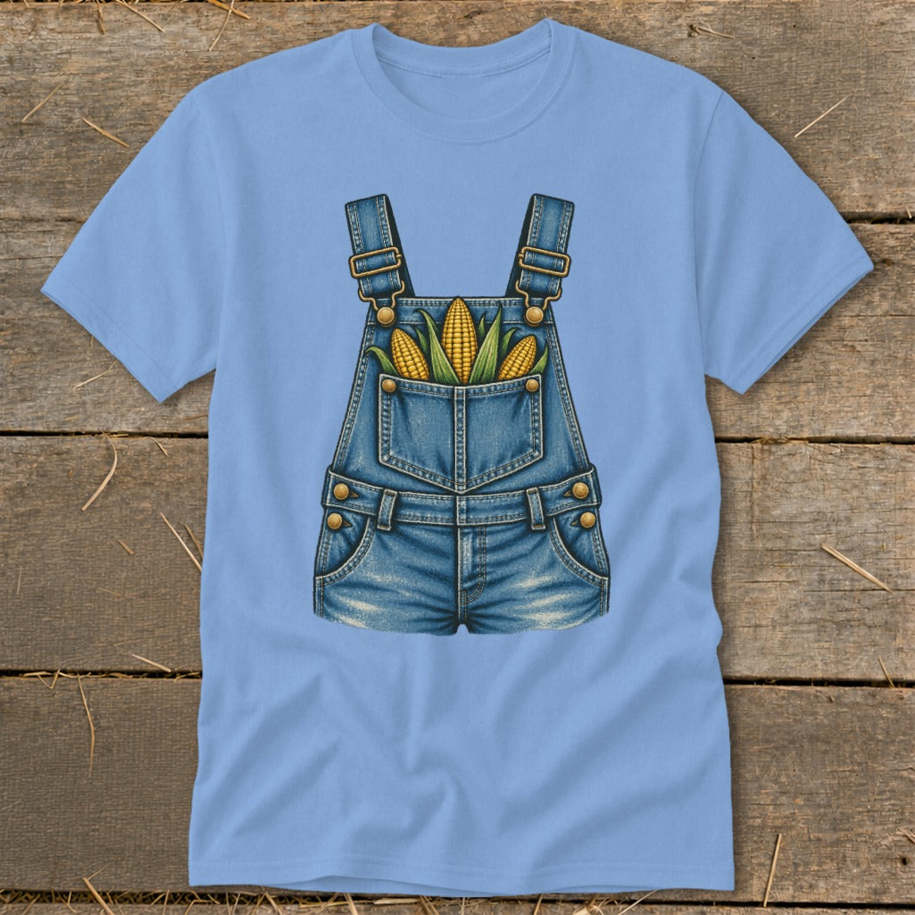 Light blue t-shirt with a denim overalls graphic filled with corn cobs.