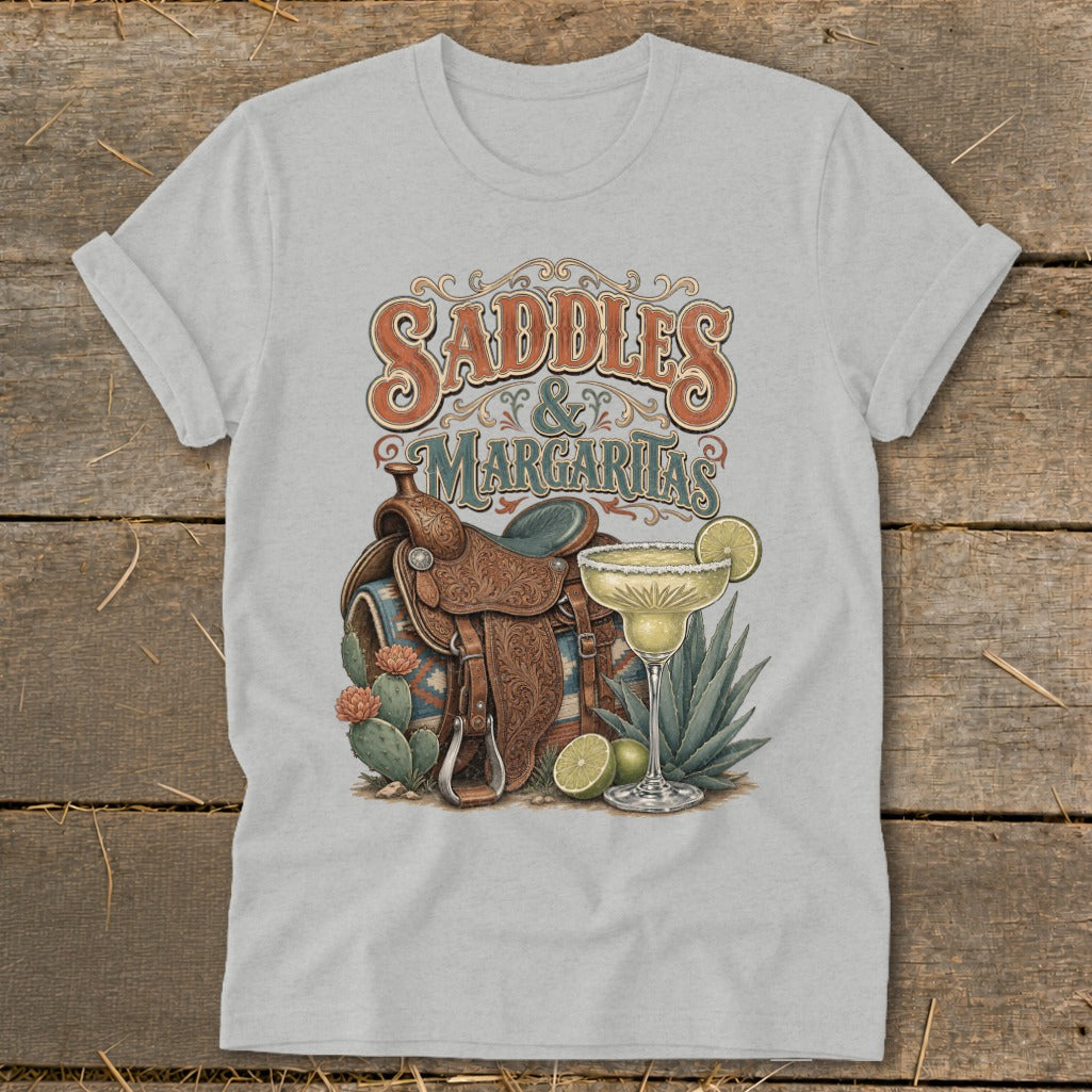 Light grey t-shirt with "Saddles & Margaritas" graphic featuring a western saddle.