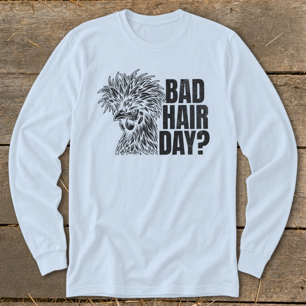 White long-sleeve shirt with black print of a crested chicken and text "BAD HAIR DAY?".