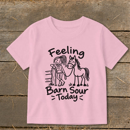 Pink t-shirt with black drawing of girl and horse, says "Feeling Barn Sour Today."