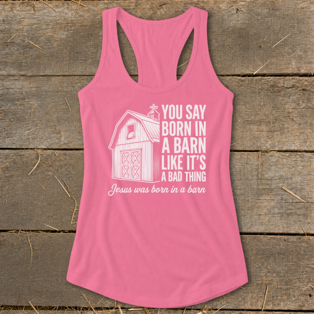 Pink tank top with a barn graphic and text: "You say born in a barn like it's a bad thing. Jesus was born in a barn."