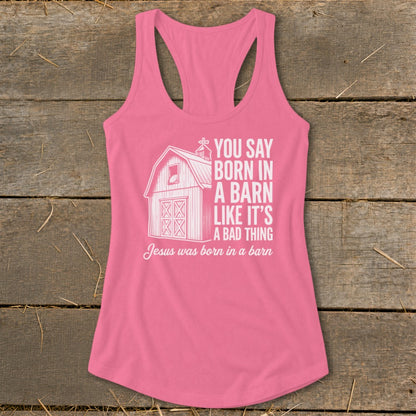 Pink tank top with a barn graphic and text: "You say born in a barn like it's a bad thing. Jesus was born in a barn."