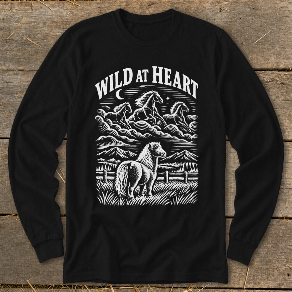 Black long-sleeve shirt with "WILD AT HEART" text and a herd of horses in a landscape.