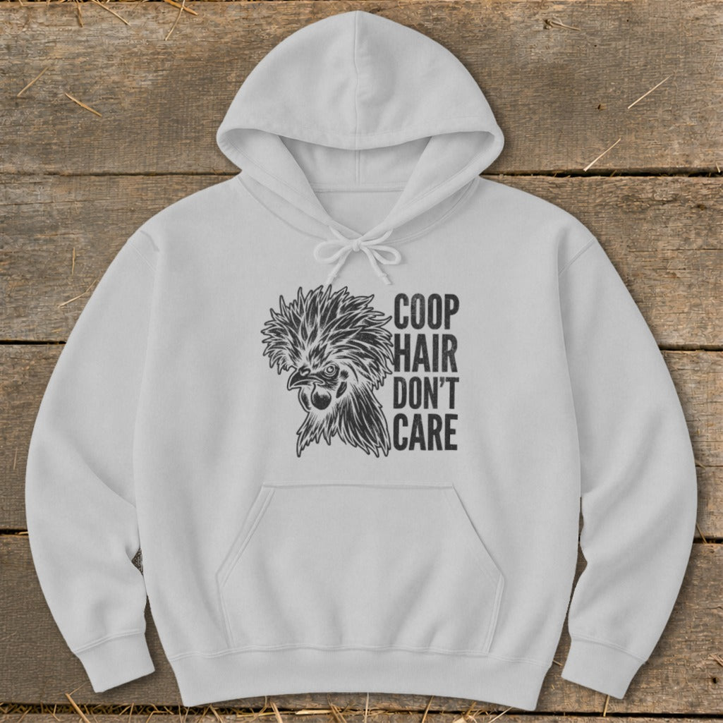 White hoodie with a graphic of a rooster and the text "Coop Hair Don't Care."