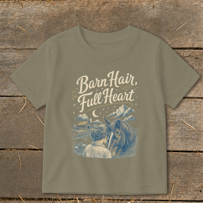 T-shirt with "Barn Hair, Full Heart" text over a girl and horse in a farm scene.
