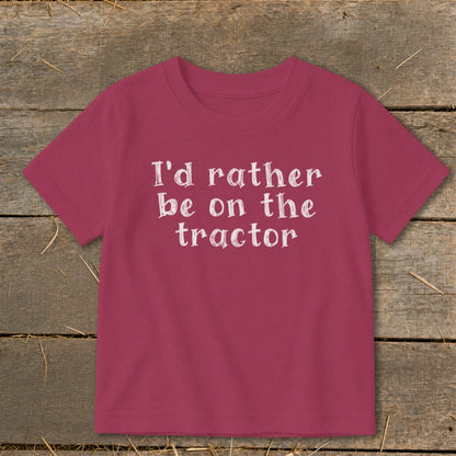 Maroon t-shirt with white text that reads "I'd rather be on the tractor".
