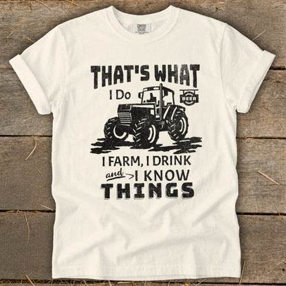 Cream t-shirt with distressed graphic of tractor and text "That's What I Do".