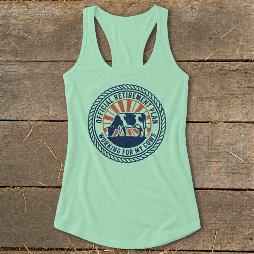 Mint green tank top with a circular graphic of a cow and text.