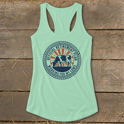 Mint green tank top with a circular graphic of a cow and text.