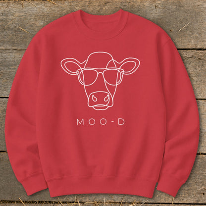 Red sweatshirt with white line drawing of a cow wearing sunglasses and text MOO-D.