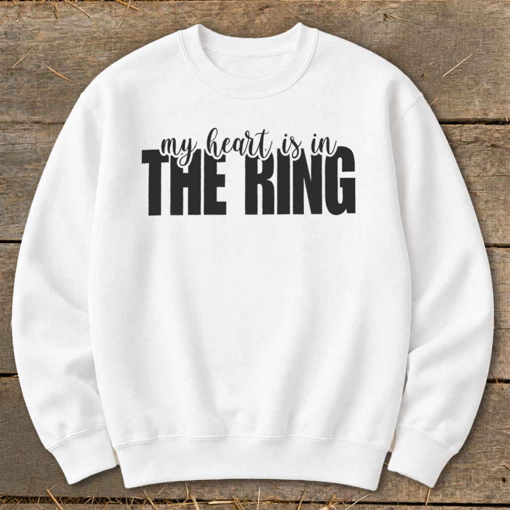 White sweatshirt with "my heart is in THE RING" text.