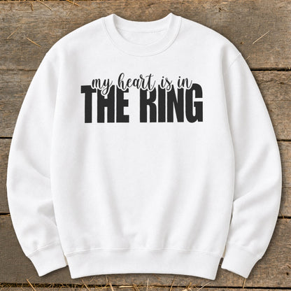 White sweatshirt with "my heart is in THE RING" text.