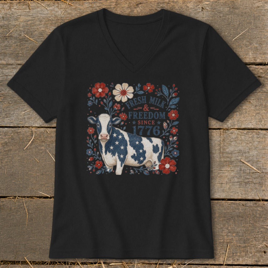 Black t-shirt with patriotic cow and "Fresh Milk & Freedom Since 1776" text.