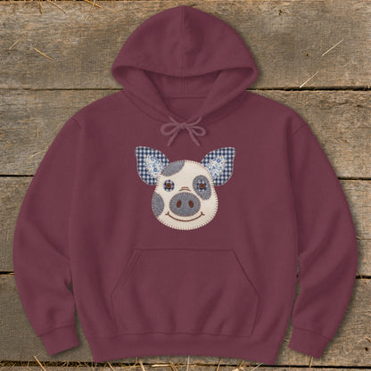 Maroon hoodie with a stitched pig face applique featuring gingham ears.