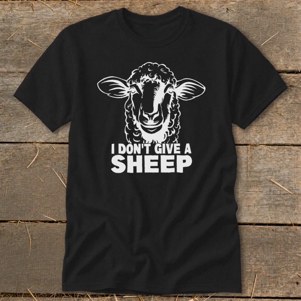 Black t-shirt with white graphic of a sheep and text "I DON'T GIVE A SHEEP".