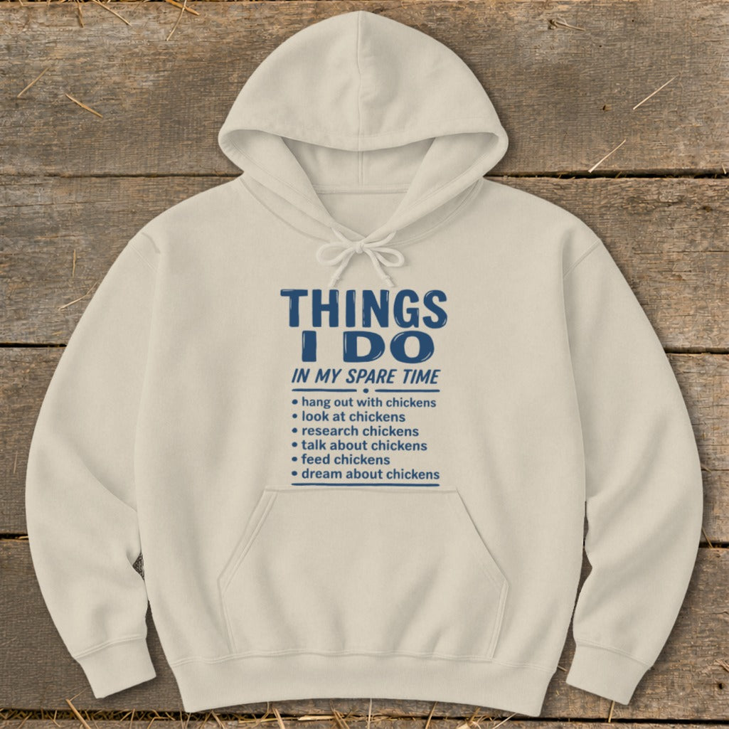 Cream hoodie with text listing "Things I Do In My Spare Time" related to chickens.