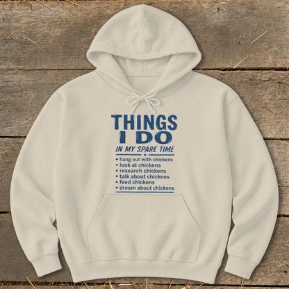 Cream hoodie with text listing "Things I Do In My Spare Time" related to chickens.