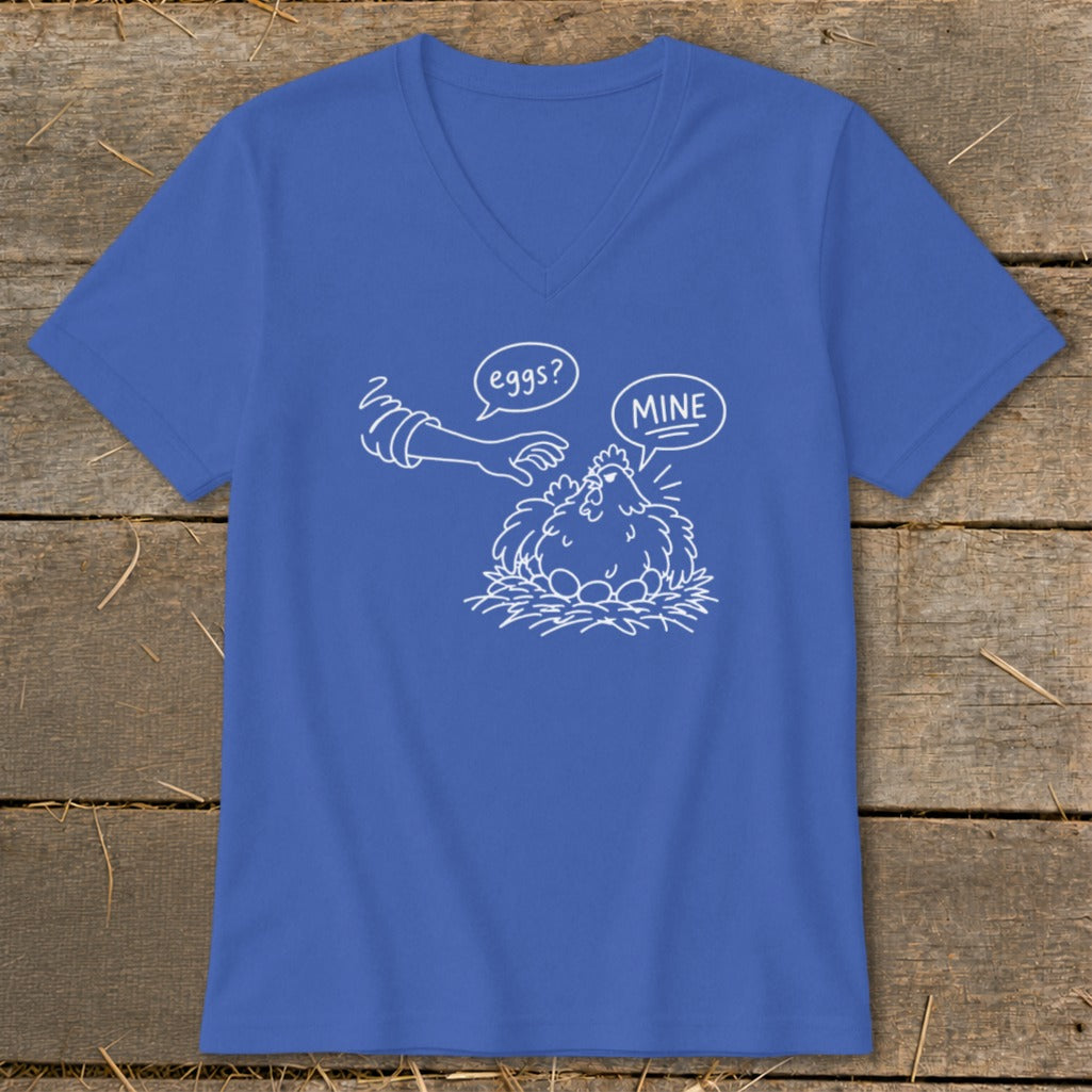 Blue v-neck t-shirt with a white line drawing of a chicken and eggs, asking "eggs?" and saying "MINE".