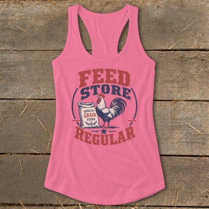 Pink tank top with rooster, bag of grain, and text FEED STORE REGULAR.