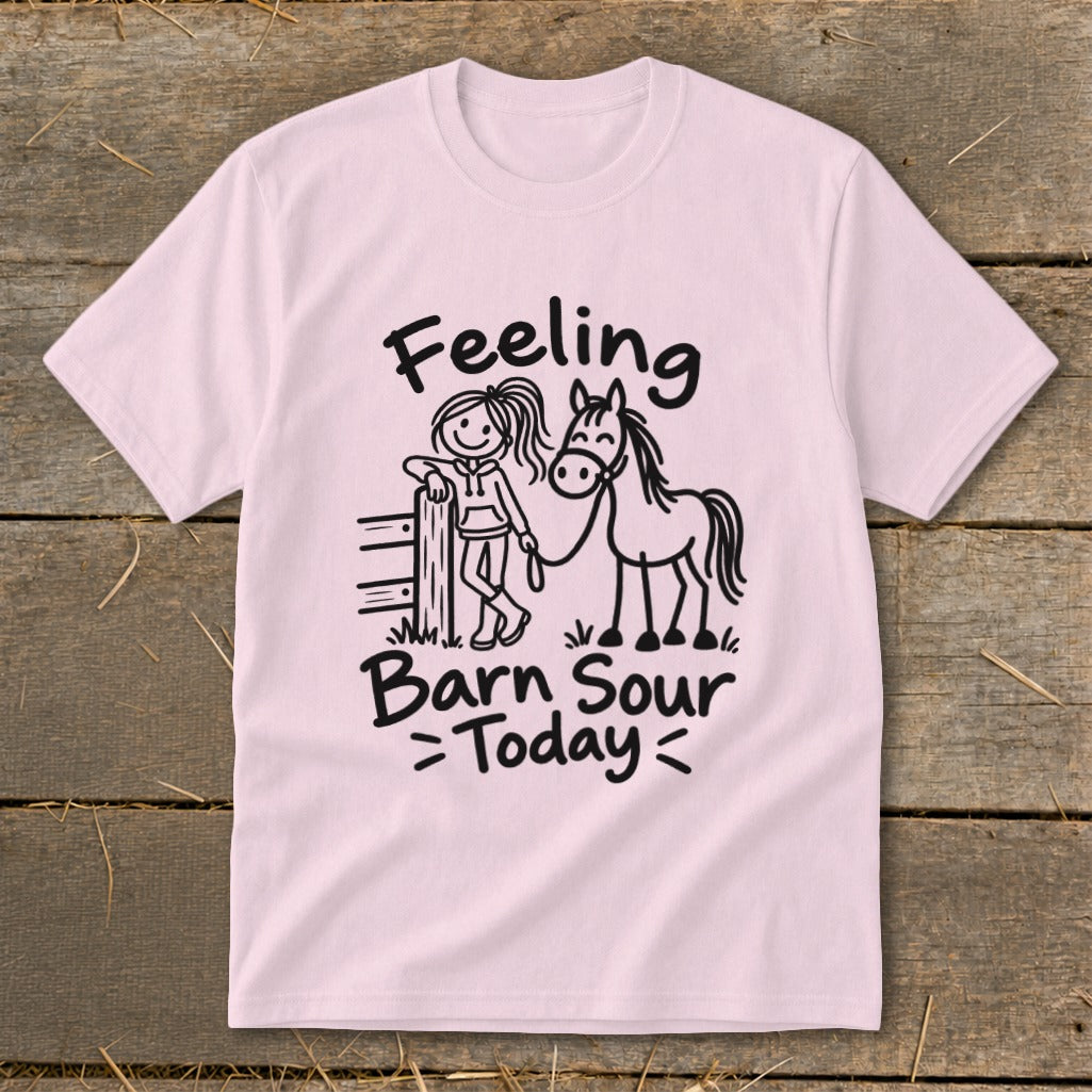 Pink t-shirt with a stick figure girl and horse graphic, reading "Feeling Barn Sour Today".