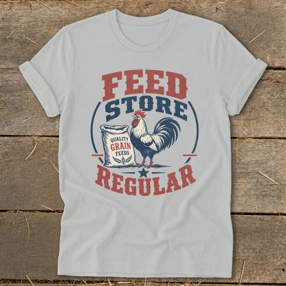 White t-shirt with graphic of a rooster and bag of grain, text reads "FEED STORE REGULAR".