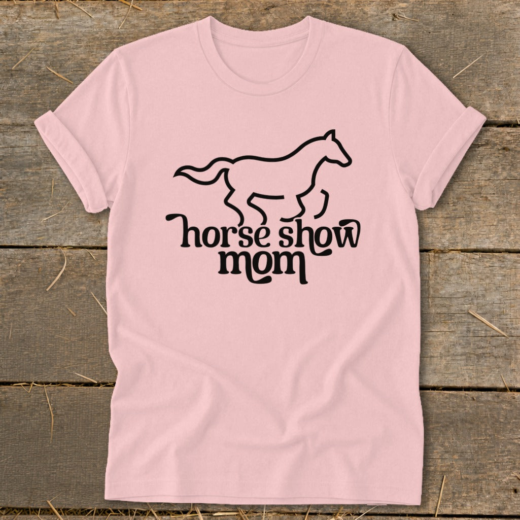 Pink t-shirt with black outline of a running horse and "horse show mom" text.