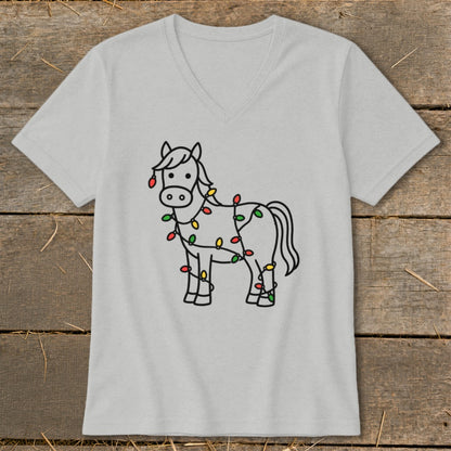 Light grey t-shirt with a black line drawing of a horse wrapped in colorful Christmas lights.