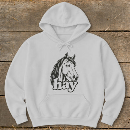 White hoodie with black graphic of a horse head and the word "hay".