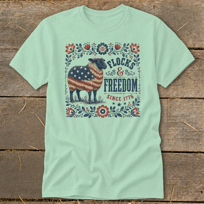 Sheep with American flag pattern and "Flocks & Freedom Since 1776" text.