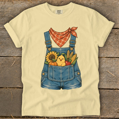 Yellow t-shirt with denim overalls graphic and farm elements.