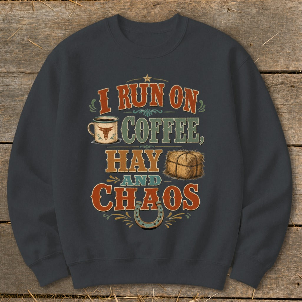Dark gray sweatshirt with text and graphics: I run on coffee, hay and chaos.