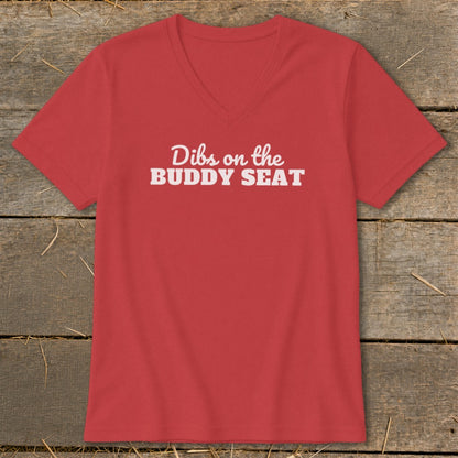 Red v-neck t-shirt with white text "Dibs on the BUDDY SEAT".
