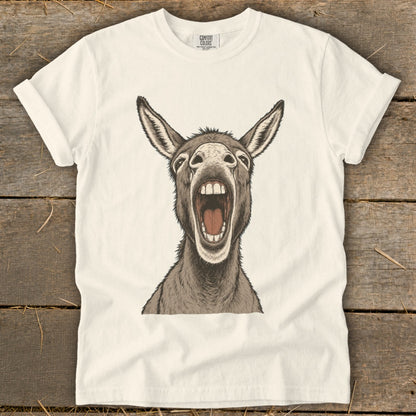 Cream t-shirt with a graphic of a donkey's head with mouth wide open.