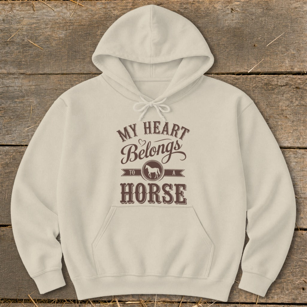 Beige hoodie with "My Heart Belongs to a Horse" graphic and horse silhouette.