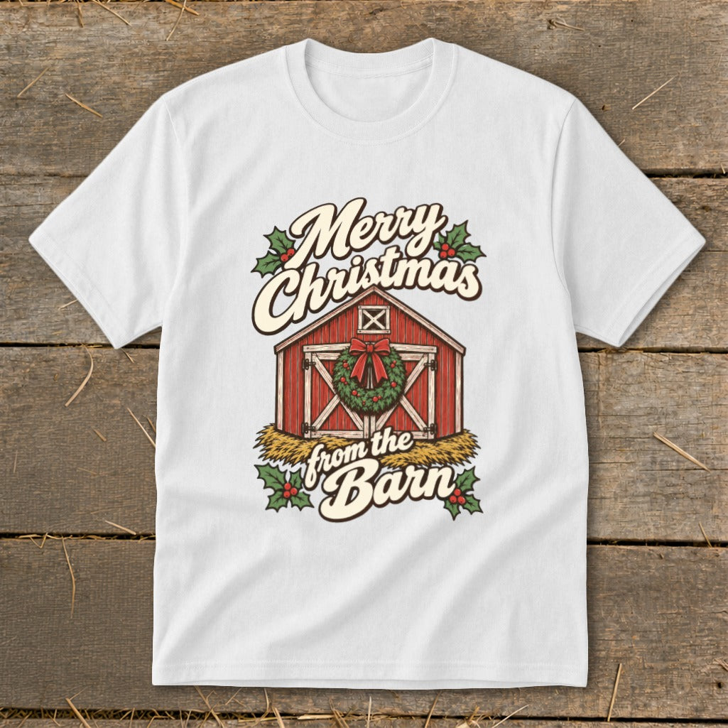 White t-shirt with vintage design of a red barn, wreath, and text "Merry Christmas from the Barn".