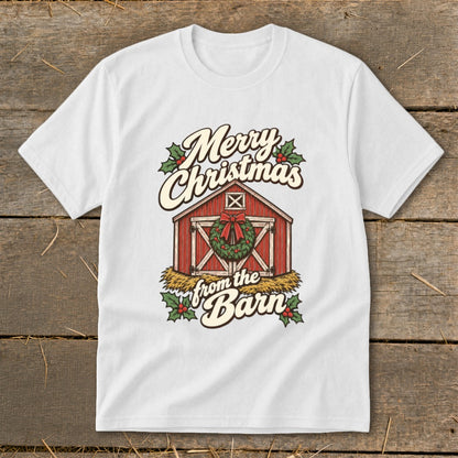 White t-shirt with vintage design of a red barn, wreath, and text "Merry Christmas from the Barn".