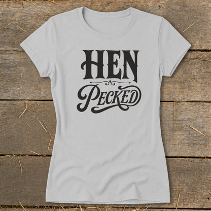 Light grey t-shirt with black text "HEN Pecked" in decorative font.